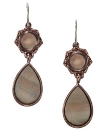 Neutral tones make Fossil's trendy teardrop earrings an essential addition to your collection. Crafted in brown ion-plated mixed metal, earrings feature circular and teardrop-shaped river shells. Base metal contains natural materials. Approximate drop: 1-1/3 inches.