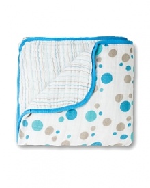 Keep baby cozy and warm with this stripes-and-spots dream blanket, crafted in gentle muslin for a naturally comfortable feel.