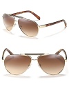 Represent summer chic in Prada's metal aviator sunglasses with a well stated top bar and tortoise arms.