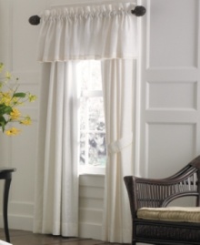 Dream of serene pastures with these Flowering Meadow window panels from Lenox. Characterized by embroidered yellow scallop trim along the hems and tiebacks, this pair of panels in crisp white enlivens your bedroom with invigorating light.