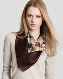 A classic, camel check print and buckle-printed brown border accent this luxurious square scarf from Burberry.