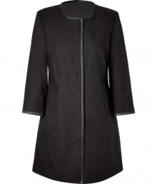 This modern-styled coat fuses has a fashion-minded fit and luxe detailing - Rounded collar, leather detailed front seam, concealed snap front closure, slit pockets, slightly belled sleeves - Style with wide leg trousers, a sheer blouse, and platforms