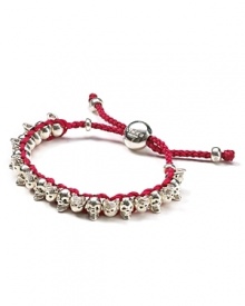 A unique friendship bracelet with sterling silver mini skulls from Links of London.