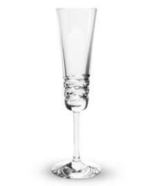 Classic technique, modern beauty. Crafted of fine Baccarat crystal, the Lola champagne flutes pair horizontal wedge cuts with a simply luminous base. The silhouettes of the toasting flutes in this collection radiate grace and sophistication.