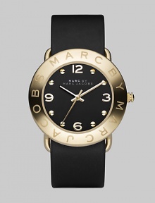 Streamlined timekeeping with a polished goldplated finish and fine leather strap.Quartz movement Water resistant to 3 ATM IP (ionic plated) gold bezel with engraved logo Stainless steel round case, 36mm, (1.42) Black dial IP gold numeral and hour markers Leather strap, 20mm, (.79) Imported 