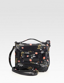 A pretty floral print on textured embossed leather for a vintage-inspired design.Top handle, 2 dropAdjustable shoulder strap, 18-20 dropMagnetic snap flap closureThree inner compartmentsOne inside zip pocketSatin lining8W X 7H X 1¾DMade in Italy