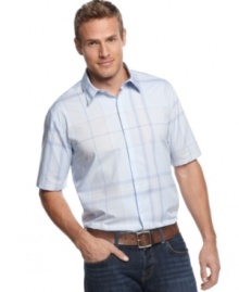 Get old-school cool in this classic plaid shirt from Calvin Klein.