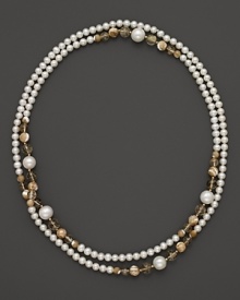 A shimmering mix of mother-of-pearl, rutilated quartz and cultured freshwater pearls.