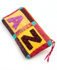 Hand quilted with funky graphic patterns, the Alphabet pouch speaks to the bright, joyful spirit of Haiti's artisan communities. A zip opening offers secure storage for money, school supplies or cosmetics.