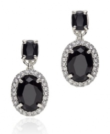 Delicious and decadent, these lush drop earrings by Monet are the epitomy of elegance. Each earring features two oval-cut jet crystals. The larger drop is surrounded by round-cut sparkling clear crystals. Crafted in silvertone mixed metal. Approximate drop: 3/4 inch.