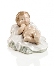 Create a beautiful nativity scene around the baby Jesus figurine from Nao by Lladro. Handcrafted porcelain is delicately glazed and sure to be cherished at every Christmas to come.