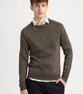 Elegant knit adds a sophisticated shimmer to a classic crewneck sweater.CrewneckRibbed knit collar, cuffs and hem91% wool/5% polyester/4% metallicDry cleanImported