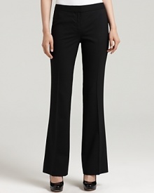 Bring timeless chic to the workday in these Elie Tahari straight-leg pants.