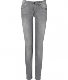 These classic skinny jeans from Seven for All Mankind lend effortless style to any casual ensemble - Five-pocket styling, distinctive logo detail on back pockets - Slim fit, skinny leg - Pair with a tunic top, printed tee, or silk blouse and heels