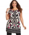 Liven up your casual style with Alfani's cap sleeve plus size tunic top, highlighted by a vivid twin print.