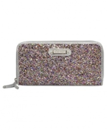 Discover your inner glam-azon with this shimmery little lovely from Nine West. Decked out in candy-colored sequin and signature detailing, its pocket-lined interior stows your stash without a worry.