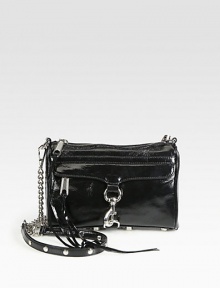 A versatile design in patent leather, accented with sleek hardware and a versatile detachable strap.Detachable chain and leather shoulder strap, 22 dropMagnetic top closureProtective metal feetOne outside zip pocket with hookOne inside zip pocketTwo inside open pocketsCotton lining9W X 6H X 1DImported