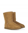 A true original and casually stylish go-to from Ugg, the classic chestnut short boot is a perennial must - Crafted from twin-faced sheepskin and featuring exposed seams, reinforced heel, traction outsole and signature Ugg label - Fleece-lined for superior warmth and comfort - Shorter, mid-calf height ideal for wearing under or over pants - Truly versatile, perfect for pairing with everything from skinny jeans to yoga pants to miniskirts