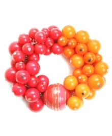 Bright as bubblegum, Haskell's candy-colored bracelet will make your look pop! Bracelet features striped beads in orange and fuchsia hues set in mixed metal. Bracelet stretches to fit wrist. Approximate diameter: 2-1/2 inches.