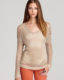 Breezy chic defines this open knit sweater featuring glimmering golden Lurex® threading for eye-catching glamour that won't overwhelm you.