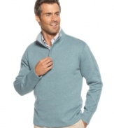 Stay warm with hot style in this handsome 1/4-zip ribbed sweater from Tasso Elba.