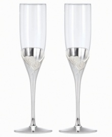 Toast your sweetie or favorite newlyweds with True Love. Interlocking hearts adorn elegant, silver-plated champagne flutes, a fitting way to commemorate every anniversary.  Qualifies for Rebate