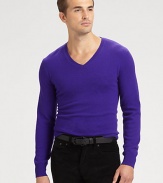 Luxuriously jersey-knit from soft cashmere yarns, a handsome sweater epitomizes modern polish in a trim, streamlined silhouette.V-neckRibbed knit collar, cuffs and hemCashmereDry cleanImported