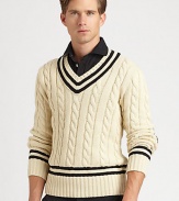 Fashioned in a heritage cable knit from luxe Italian cotton, a classic V-neck sweater is adorned with cricket stripes and herringbone wool elbow patches for authentic style.V-neckRibbed collar, cuffs and hemElbow patch detailCottonHand washImported