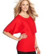 Joseph A's tunic sweater gives you a new way to wear stripes! A row of shoulder buttons offsets the chic damask pattern.