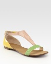 Colorblocked patent leather with an on-trend, adjustable t-strap. Patent leather upperLeather lining and soleImported