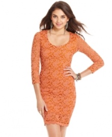 Doll-up in American Rag's alluring, three-quarter sleeve evening dress! A lace overlay and curve-hugging silhouette sets the pace for others to follow.