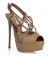 Add rock n roll luxe to your look with these tough-meets-chic platform sandals from Valentino - Peep-toe, crisscross python-embossed front straps with studded detailing, ankle strap with buckle closure, ultra high front platform and stiletto heel - Pair with wide leg trousers and a fitted blouse or with a figure-hugging cocktail frock