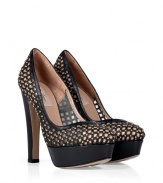 Step up sharply tailored looks with Valentinos eye-catching platform pumps, detailed with allover studding for edgy and alluring results guaranteed to make an impact - Round toe, black leather trim, sheer upper with studded leather grid overlay, nude underlay at cap and counter - Wear as a statement finish to sharply tailored looks