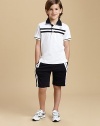 Sporty stripes, perfectly placed on soft cotton knit for a look of sophisticated ease. Polo:Polo collar with logo and microstriped liningButton placketShort sleeves with ribbed color-tipped cuffsChest stripes and front logoEven side vented hem Shorts:Elasticized pull-on waistSide racing stripesOne back patch pocket with logoCottonMachine washImportedPlease note: Number of buttons may vary depending on size ordered. 