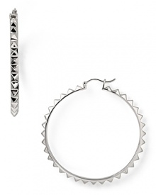 Inject some serious edge into your daytime look with this pair of spiked hoop earrings from nOir. In silver plate, it's hard to find an outfit these tough-chic beauties wouldn't work with.