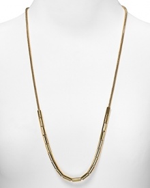 Lend looks a hint of sinuous shine with this sliding link necklace from MICHAEL Michael Kors. In a dramatic length, it's a gleaming focal point for every outfit.