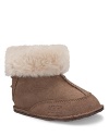 A cutie bootie from UGG® Australia, with elastic back and shearling lining to keep their feet warm and dry.