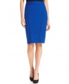 Look sharp! Alfani's faux leather-trimmed petite pencil skirt instantly adds modern polish to your wardrobe.