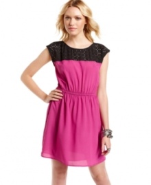 Perforated in laser cutouts and rocking super-stark colorblock style, BeBop's cap sleeve dress is a vivid look for day!