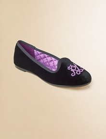 Stylish ballet flats in plush velvet features a contrasting embroidered script monogram at the toe.Slip-onVelvet upperQuilted liningLeather soleImported