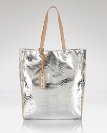 Take a shine to practical accessorizing with this tote from Sam Edelman. Ideally sized for days on the go and trimmed in sturdy leather, it's a striking way to carry on.