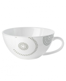 Tiny squares with a hint of shine run circles inside and around this glossy white teacup from Mikasa dinnerware. These dishes are from a fresh, spirited collection that's made for modern tables. Sparkle Circles features minimalist shapes in sturdy bone china for anytime use.