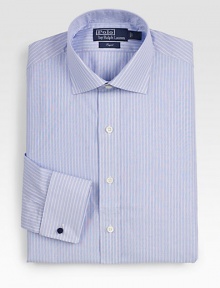 A trim-fitting Regent dress shirt in crisp cotton broadcloth with slim stripes and French cuffs. Buttonfront Moderate spread collar French cuffs Cotton Machine wash Imported 