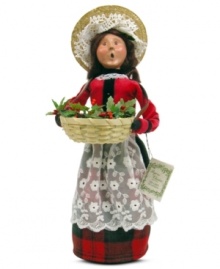 In the business of decking halls with boughs of holly, this festively dressed merchant sells the traditional red and green plants of Christmas. A beautiful figurine from the Cries of London collection, with the handcrafted charm of Byers' Choice.