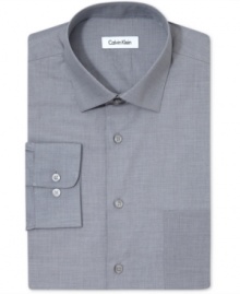 Get a firm handle on solid office-style and comfort with this dress shirt from Calvin Klein.