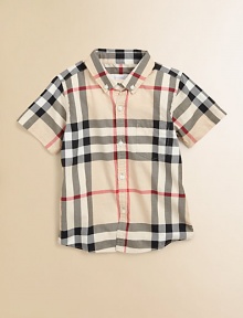 Fashioned in the renowned check design, this breezy cotton button-down features a shirttail hem and patch pocket.Button-down collarShort sleevesButton-frontFront patch pocketShirttail hemCottonMachine washImported Please note: Number of buttons may vary depending on size ordered. 