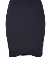 Sumptuously soft and effortlessly elegant, Donna Karans pure, ink blue cashmere knit skirt epitomizes understated luxury - Curve-hugging, medium-rise pull on style with hidden elasticated waist - Gorgeous signature drape and twist detail at hem - A chic go-to in any wardrobe perfect for pairing with cashmere pullovers, silk tops or button downs and ankle booties or platform pumps