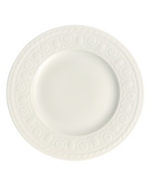 Distinguished by rich relief patterns in milky white china, the Cellini collection brings European classicism to the table. Salad plate is adorned with an ornate braided edge and floret-patterned rim. Microwave and dishwasher safe.