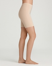 Cut a slim silhouette with SPANX® thigh shaper.