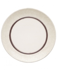 A universal favorite, the Lucia dinner plate combines a modern shape and classic style. Earthy stoneware with a crackle effect and lustrous metallic glaze brings easy sophistication to casual settings. By Niels Refsgaad for Dansk.